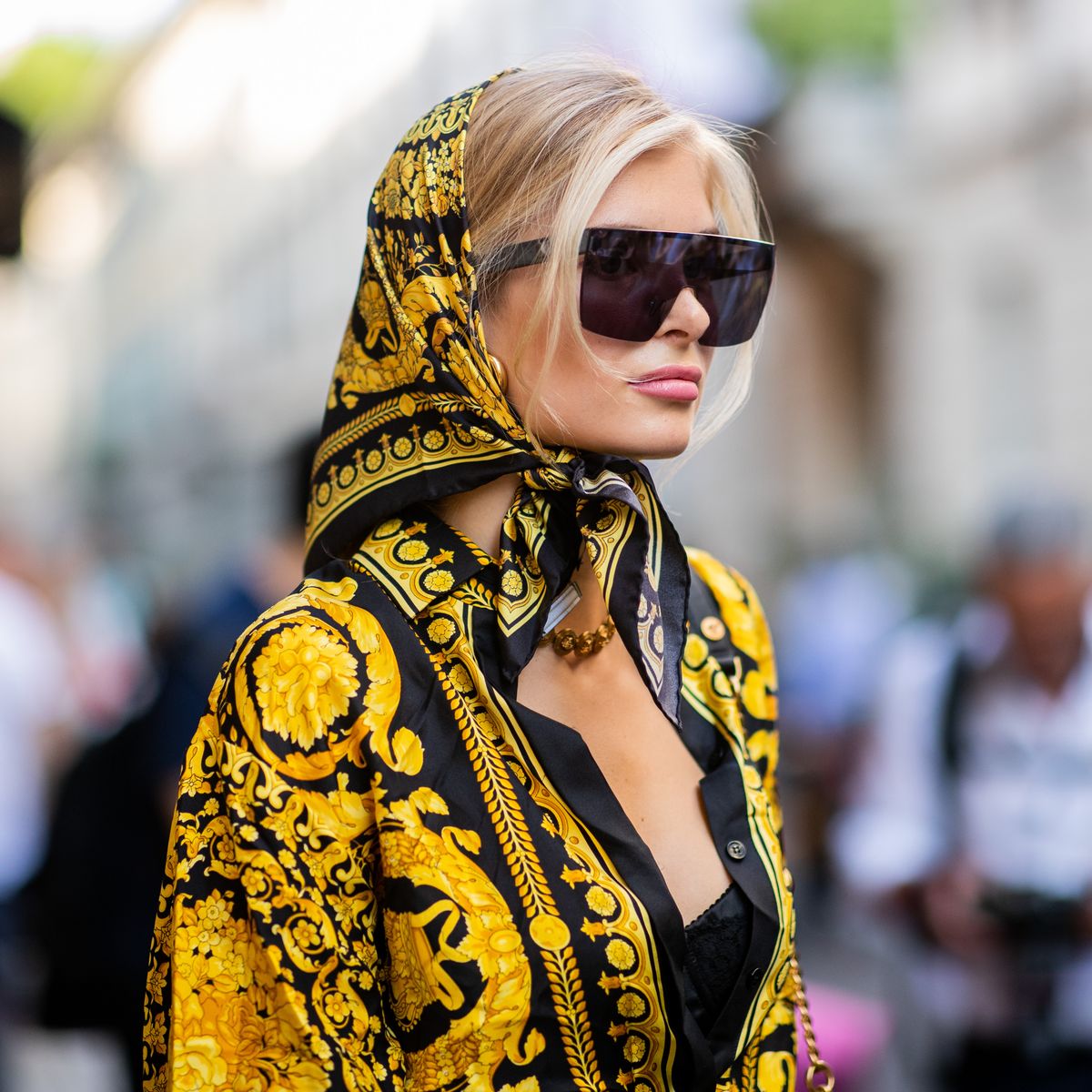 The girls exude a luxurious and seductive aura with silk scarves